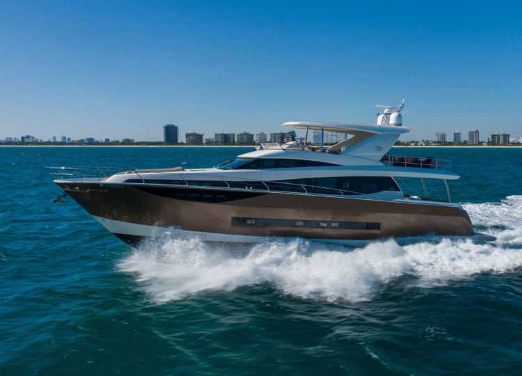 Charter yacht Prestige 75 cruising in Miami.